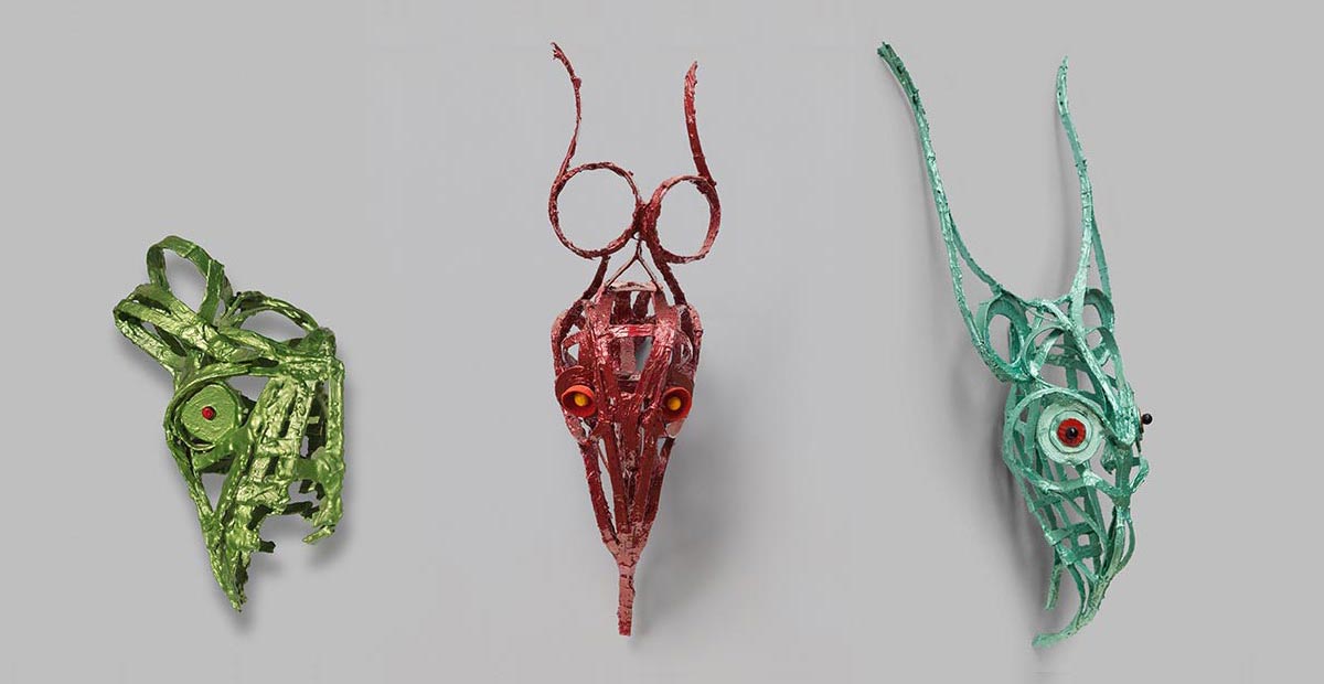 Angelo Canevari, Strutture series: three Bucrania in green, red and turquoise metallic paint, wall-mounted heraldic forms, from the Strutture series, Arco Gallery
