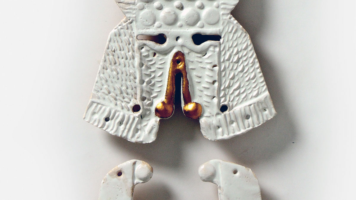 Close-up of glazed ceramic sculpture by Giorgio Crisafi focusing on archetypal structure, texture, and material presence