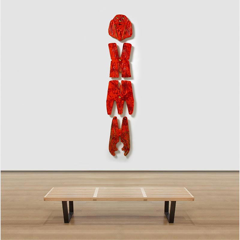 View in a room of a figurative expressionist totemic sculpture by Giorgio Crisafi. Mainly red colors. Title: Bonds VII