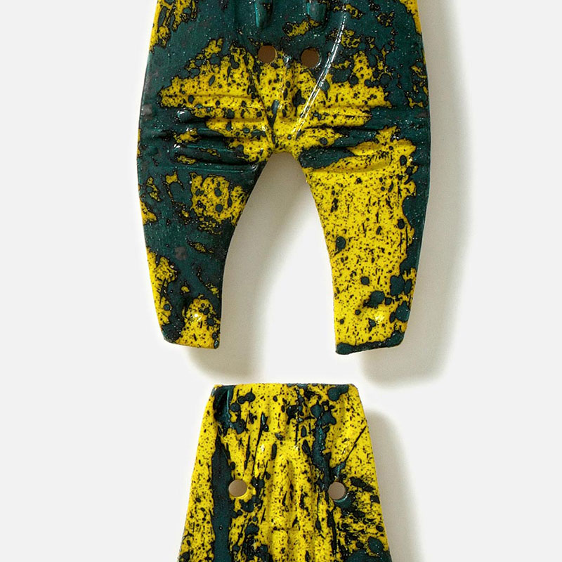 Detail of a figurative expressionist totemic sculpture by Giorgio Crisafi. Mainly yellow, black colors. Title: Bonds XX