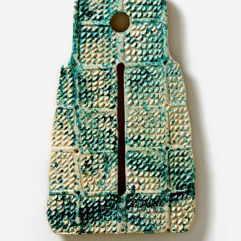 Detail of a figurative expressionist totemic sculpture by Giorgio Crisafi. Mainly grey, green colors. Title: Bonds XVIII