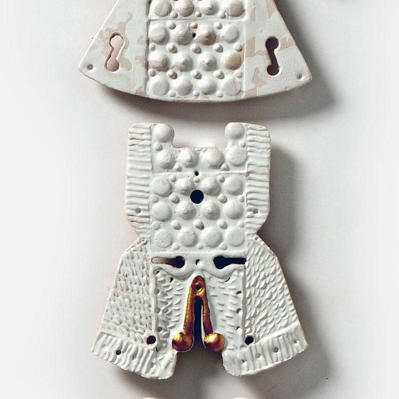 Detail of a figurative xpressionist sculpture of an anthropomorphic figure inspired by ancient canopus in Egyptian and Etruscan culture by Angelo Canevari. Mainly brown colors. Title: Bonds XV