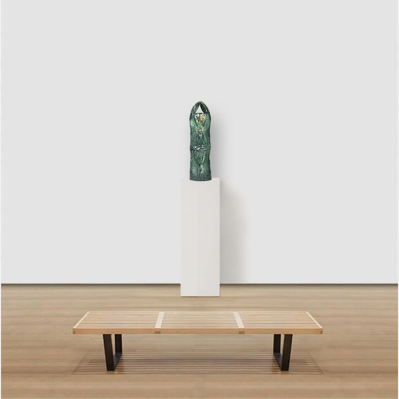 View in a room of a figurative expressionist totemic glazed ceramic sculpture by Giorgio Crisafi. Mainly green colors. Title: Apparition II