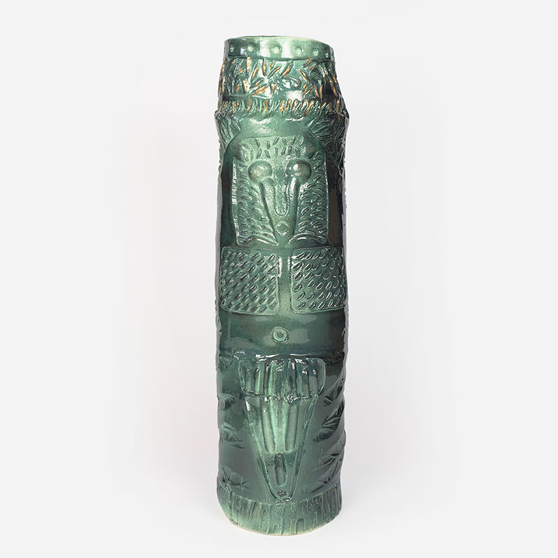 Figurative expressionist totemic glazed ceramic sculpture by Giorgio Crisafi. Mainly green colors. Title: Apparition IV