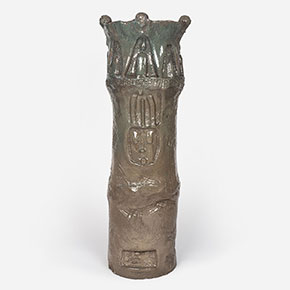 Figurative expressionist totemic glazed ceramic sculpture by Giorgio Crisafi. Mainly brown colors. Title: Earth Apparition. Link to the artwork's dedicated page featuring high-resolution detailed images, full info, and an in-depth analysis of its artistic significance.