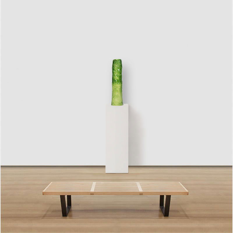 View in a room of a figurative expressionist totemic glazed ceramic sculpture by Giorgio Crisafi. Mainly green, yellow colors. Title: Greengold Apparition I