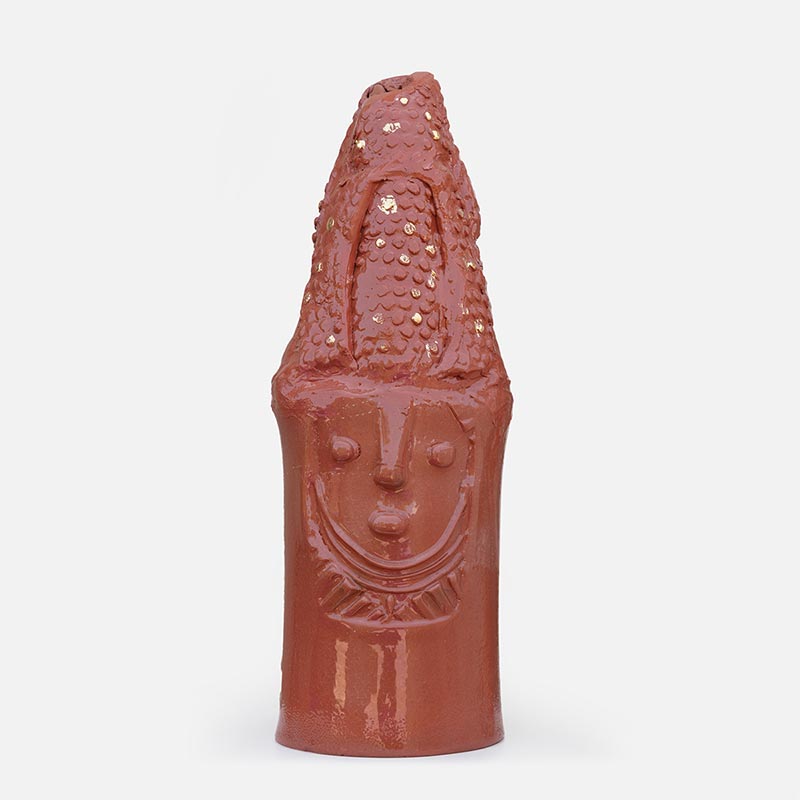 Figurative ceramic sculpture by Giorgio Crisafi, pink-orange terracotta glaze with gold on nodular scaled crown, Personaggi series. Title: Abitante in Terra II