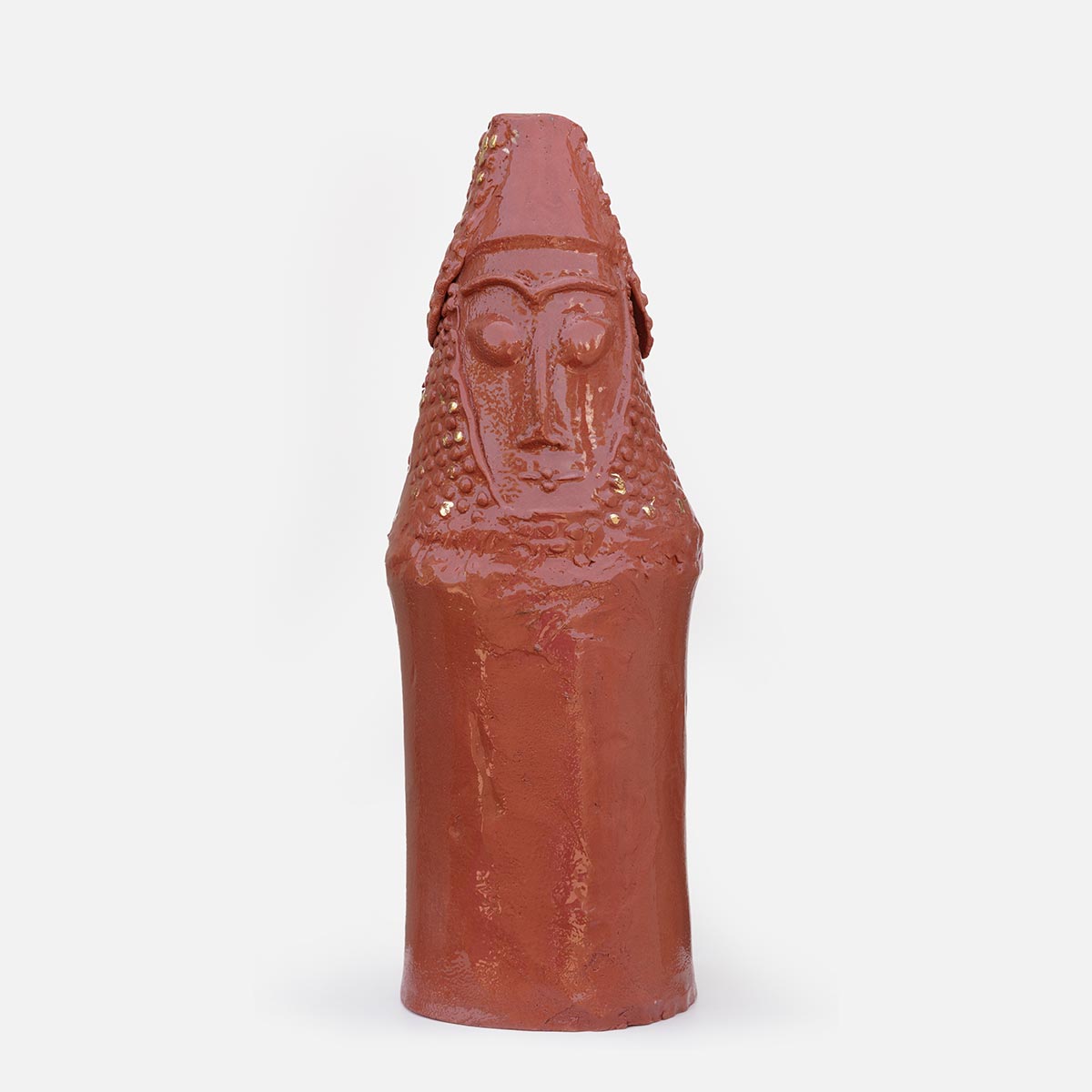 Detail of a figurative ceramic sculpture by Giorgio Crisafi, pink-orange terracotta glaze with gold on nodular scaled crown, Personaggi series. Title: Abitante in Terra II