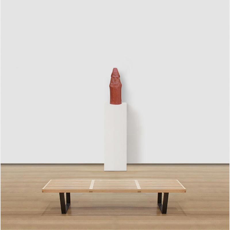 View in a room of a figurative ceramic sculpture by Giorgio Crisafi, pink-orange terracotta glaze with gold on nodular scaled crown, Personaggi series. Title: Abitante in Terra II
